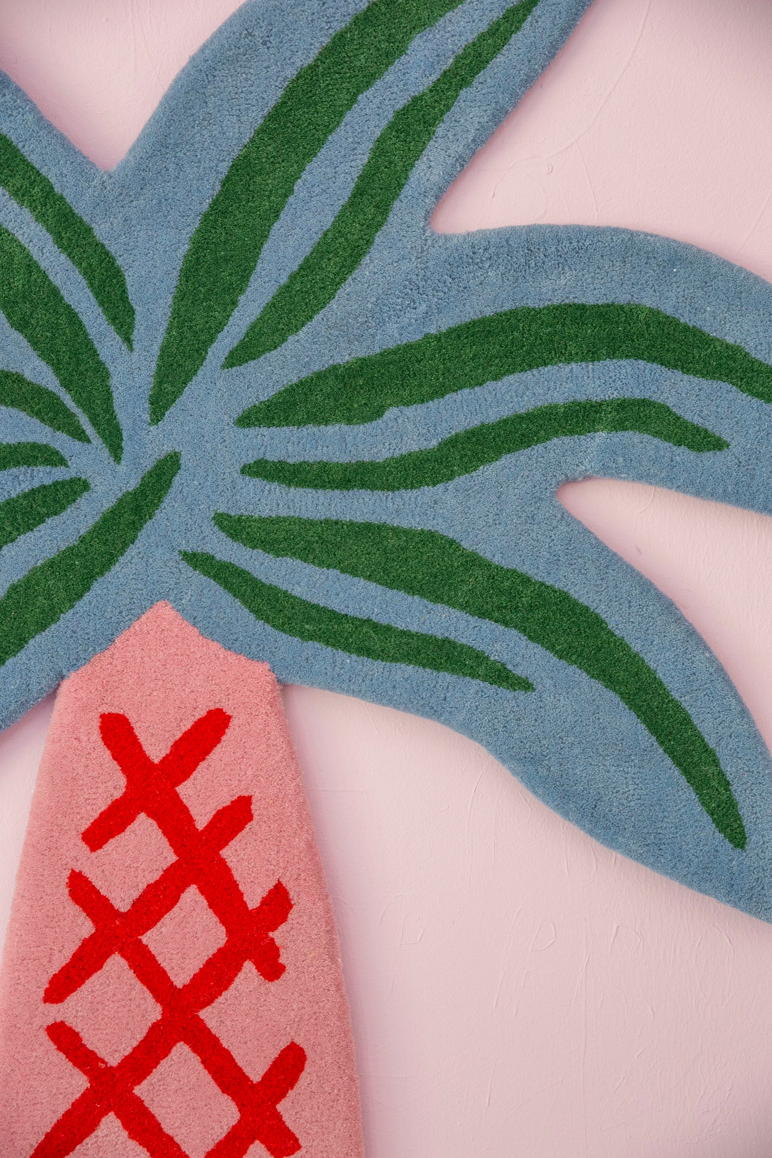 Palm tree / tufted rug / blue & pink