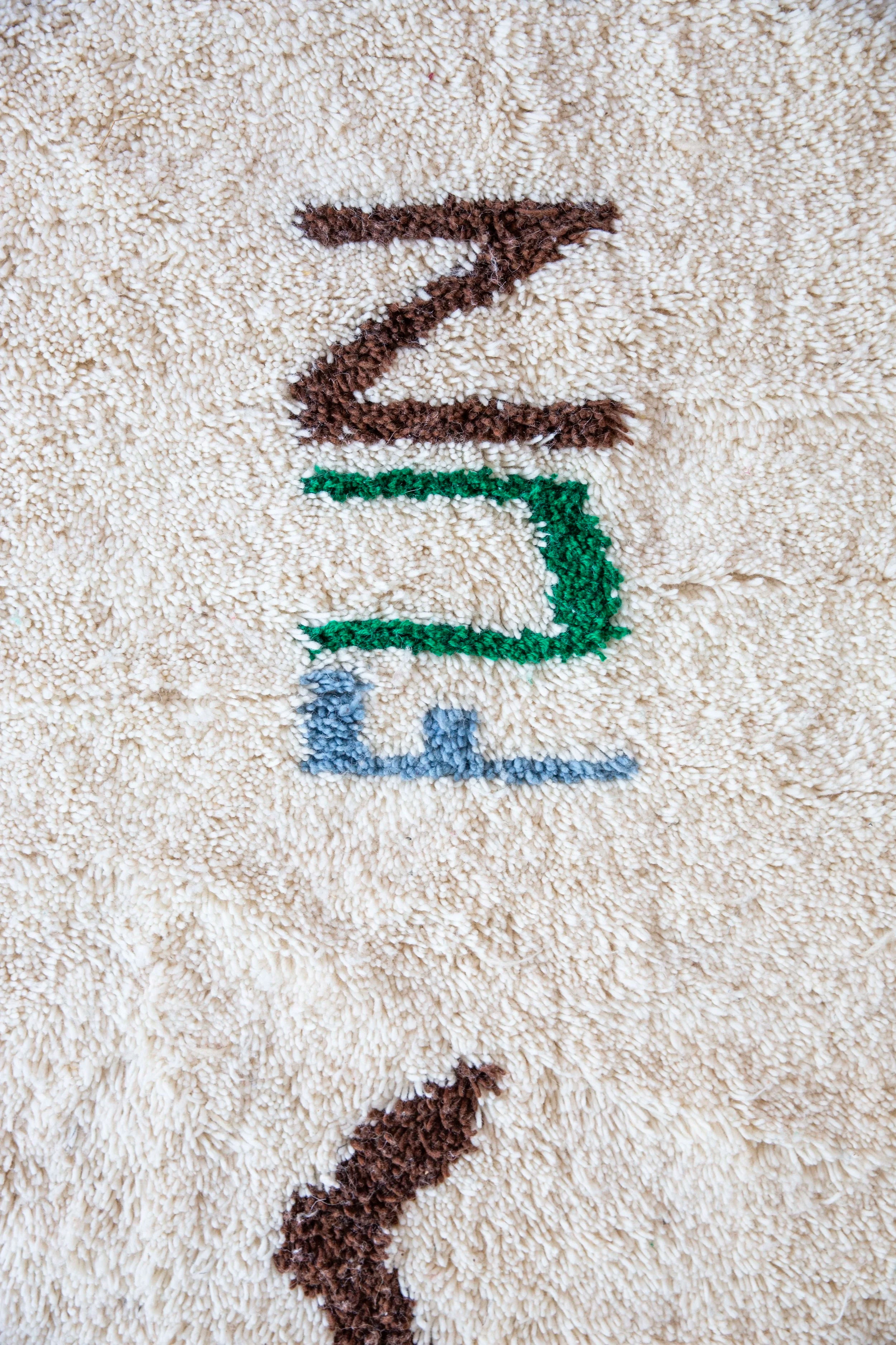 Symbols of fun / brown / wool rug XL