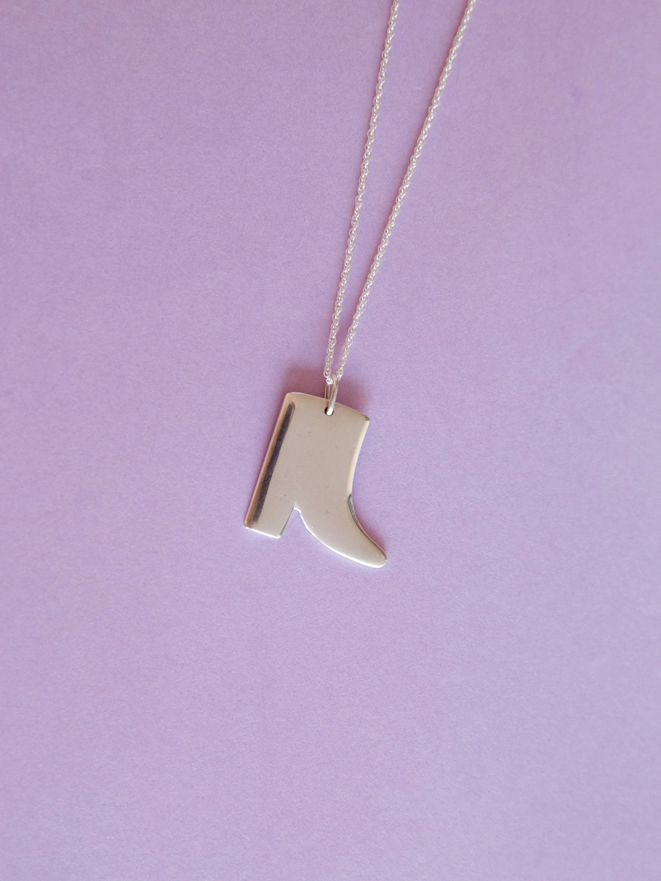 Boot / silver necklace
